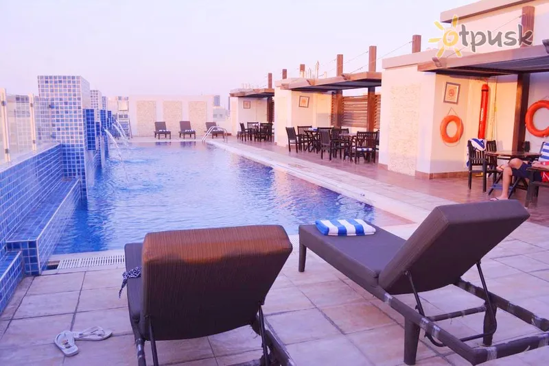 Фото отеля Tulip Hotel Apartments 4* Дубай ОАЭ экстерьер и бассейны