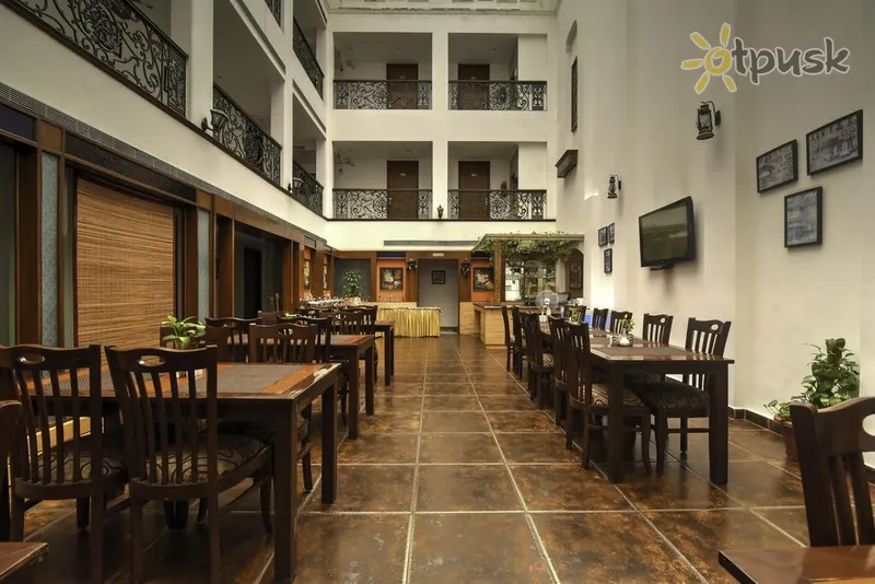 Фото отеля Capital O 16658 Anila 3* Delis Indija barai ir restoranai