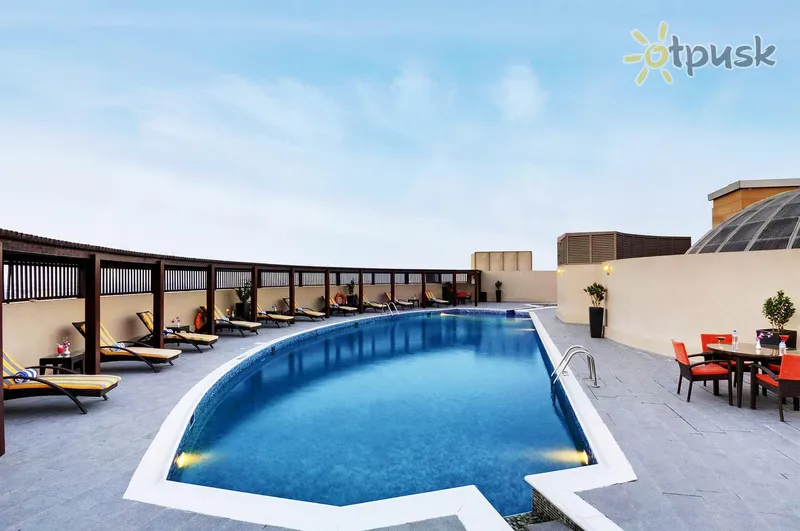 Фото отеля Lotus Grand Hotel Apartments 4* Дубай ОАЭ экстерьер и бассейны