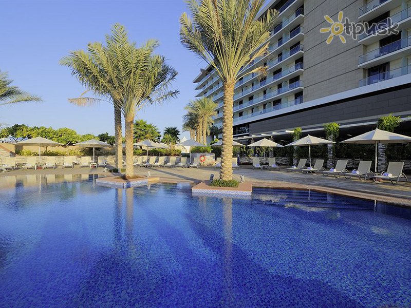 Фото отеля Park Inn by Radisson Abu Dhabi Yas Island 3* Абу Даби ОАЭ экстерьер и бассейны