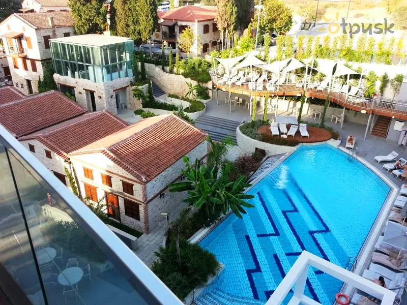 Фото отеля DoubleTree by Hilton Kusadasi 4* Кушадаси Туреччина екстер'єр та басейни