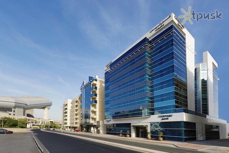 Фото отеля Courtyard by Marriott Al Barsha 4* Дубай ОАЭ экстерьер и бассейны