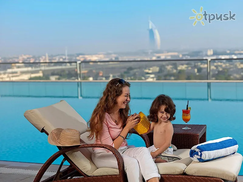 Фото отеля Two Seasons Hotel & Apartments Dubai 4* Дубай ОАЭ экстерьер и бассейны