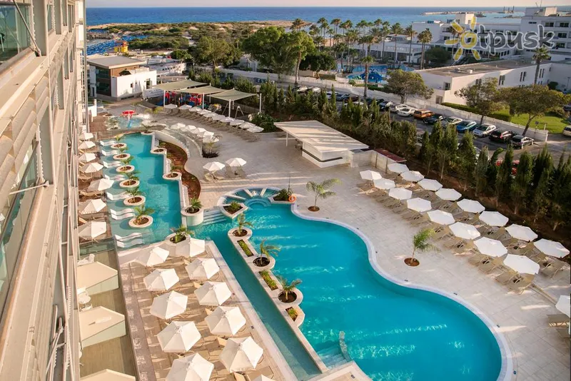 Фото отеля Asterias Beach Hotel 4* Айя Напа Кипр экстерьер и бассейны