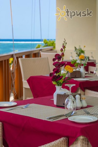 Фото отеля Holikan Beach 3* Южный Мале Атолл Мальдивы бары и рестораны