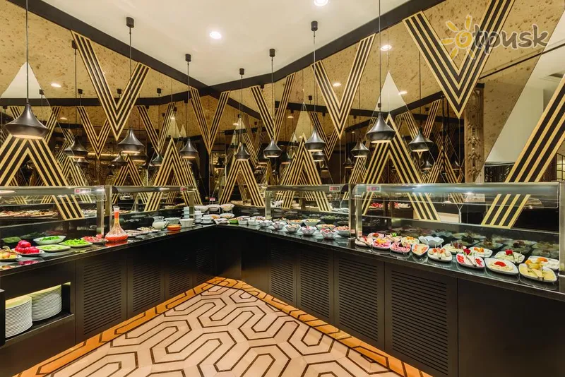 Фото отеля Ramada Hotel & Suites Istanbul Golden Horn 5* Stambula Turcija bāri un restorāni