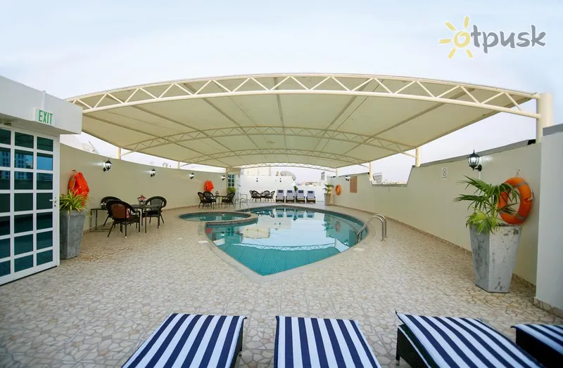 Фото отеля Dream City Hotel Apartments 4* Дубай ОАЭ экстерьер и бассейны
