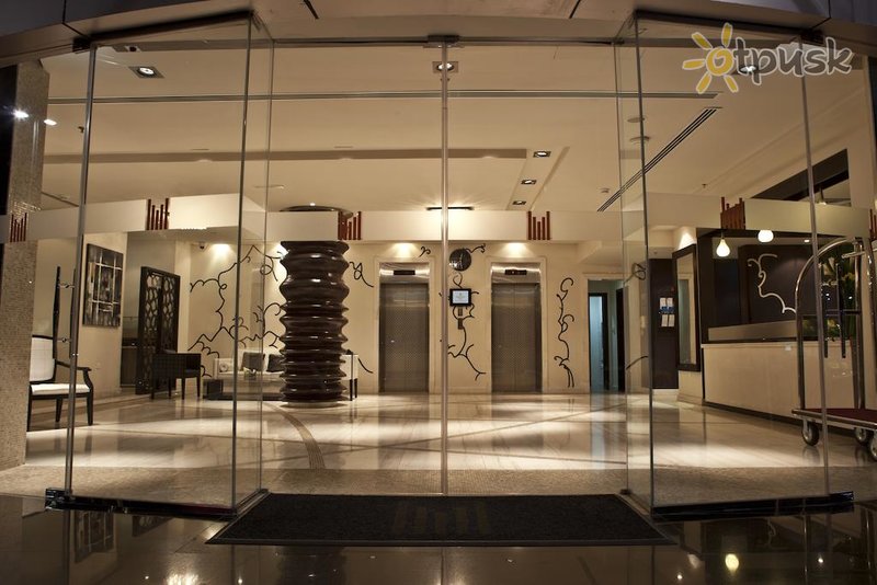 Фото отеля Kingsgate Hotel by Millennium 3* Абу Даби ОАЭ лобби и интерьер