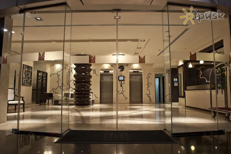 Фото отеля Kingsgate Hotel by Millennium 3* Abu Dabis JAE fojė ir interjeras