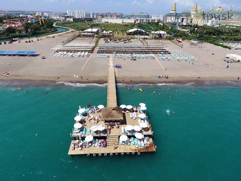 Фото отеля Ramada Resort by Wyndham Lara 5* Анталия Турция пляж