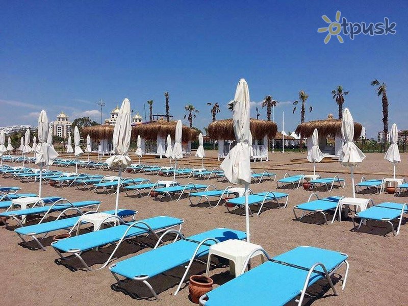 Фото отеля Ramada Resort by Wyndham Lara 5* Анталия Турция пляж