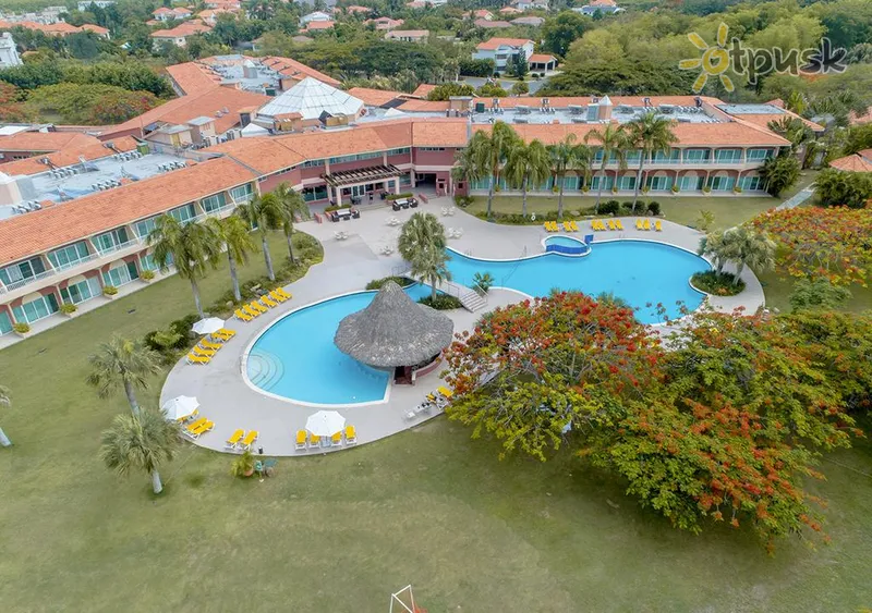 Фото отеля Hodelpa Garden Suites Golf & Beach Club 4* Chuanas Dolio Dominikos Respublika išorė ir baseinai