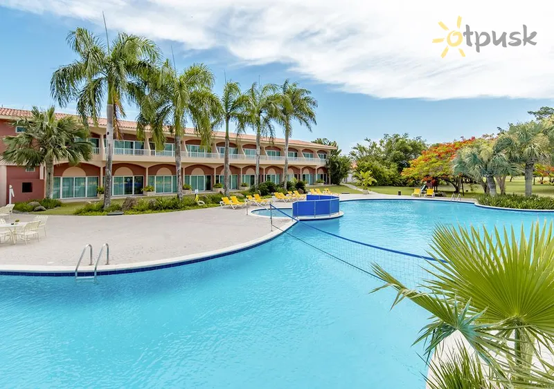 Фото отеля Hodelpa Garden Suites Golf & Beach Club 4* Huans Dolio Dominikānas republika ārpuse un baseini