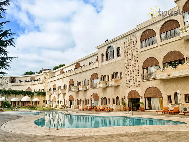 Фото отеля Uchisar Kaya 4* Каппадокія Туреччина екстер'єр та басейни