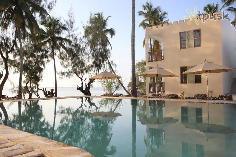 Фото отеля Zanzibar Bay Resort 4* Уроа Танзания экстерьер и бассейны
