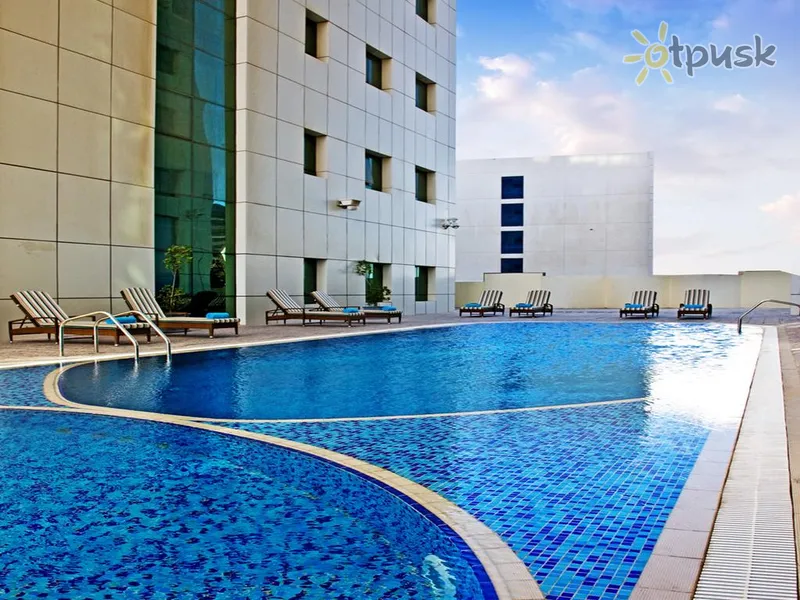 Фото отеля Swiss Belhotel Doha 4* Доха Катар экстерьер и бассейны