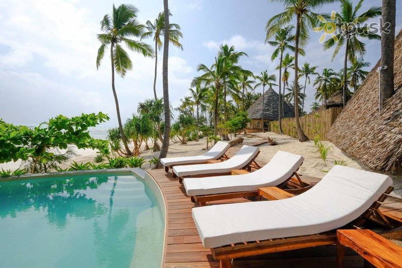 Фото отеля Baladin Zanzibar Beach Hotel 4* Пингве Танзания экстерьер и бассейны
