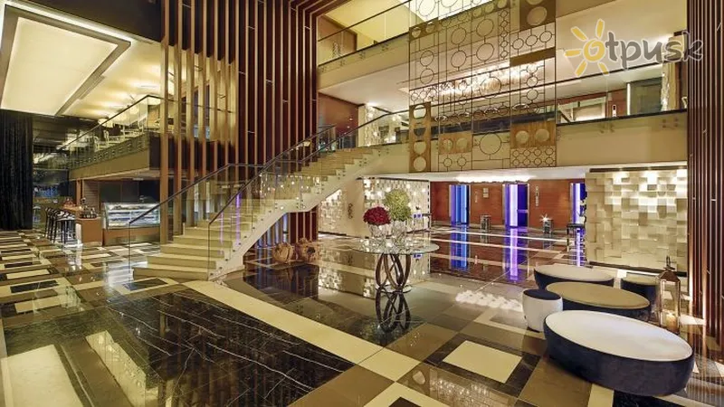Фото отеля Four Points by Sheraton Doha 4* Doha Katara vestibils un interjers