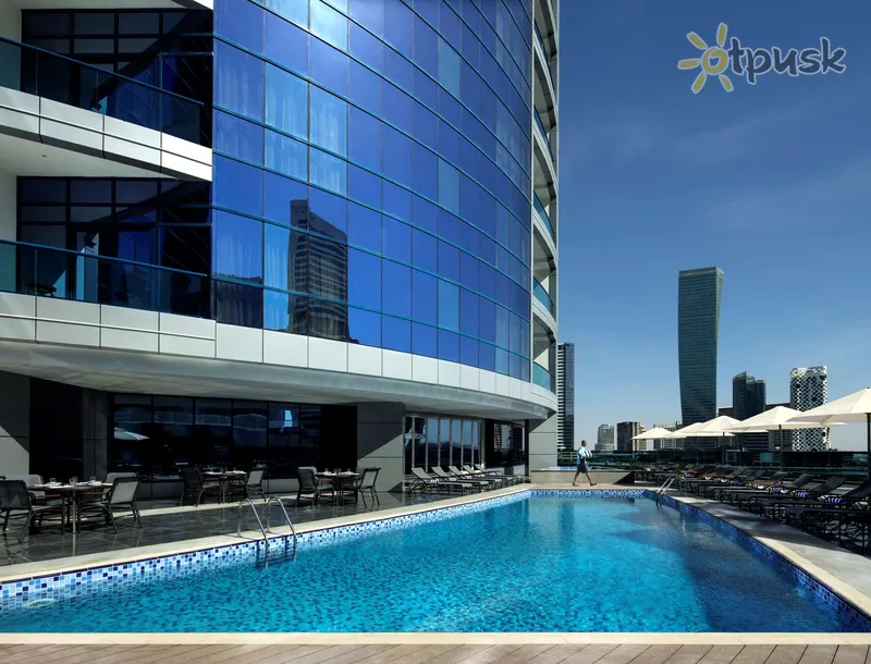 Фото отеля Radisson Blu Hotel Dubai Waterfront 5* Дубай ОАЭ экстерьер и бассейны