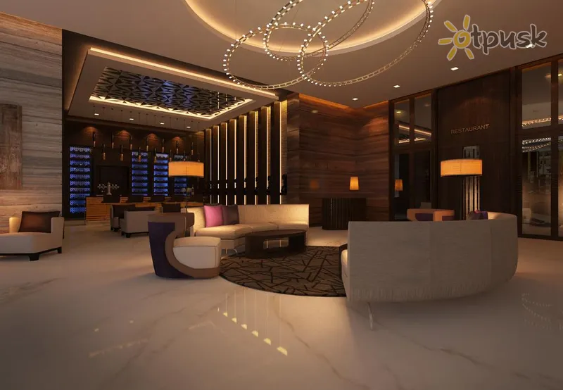 Фото отеля Radisson Blu Hotel Dubai Waterfront 5* Дубай ОАЭ лобби и интерьер