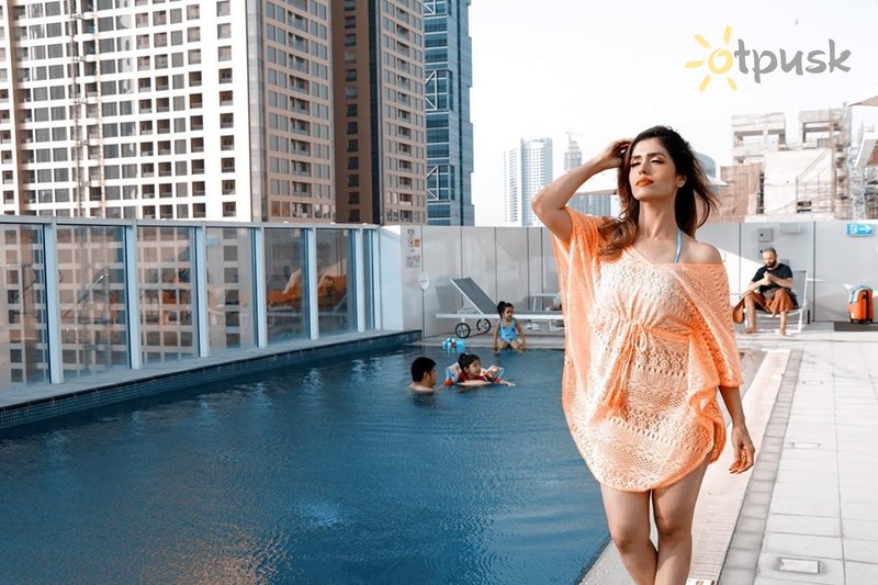 Фото отеля Dusit D2 Kenz Hotel Dubai 4* Дубай ОАЭ экстерьер и бассейны