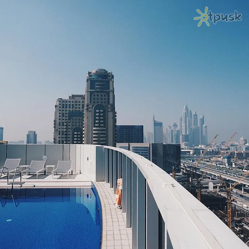 Фото отеля Dusit D2 Kenz Hotel Dubai 4* Dubajus JAE išorė ir baseinai