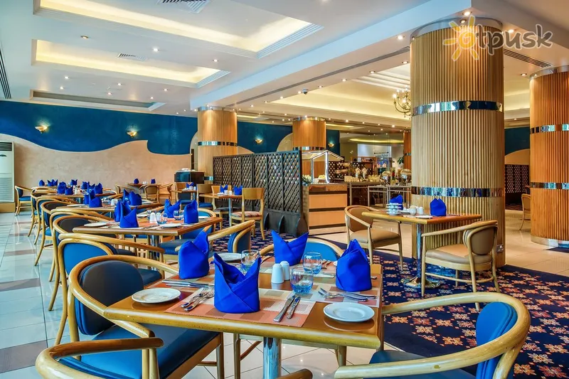 Фото отеля Holiday International Sharjah 4* Шарджа ОАЕ бари та ресторани