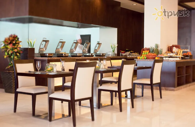 Фото отеля Movenpick Hotel Apartments Al Mamzar Dubai 5* Дубай ОАЕ бари та ресторани