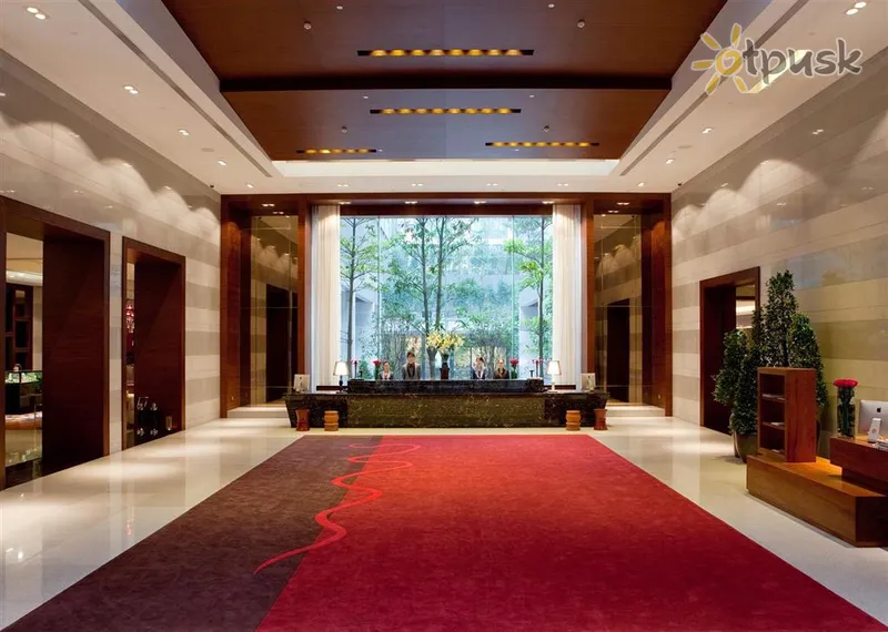 Фото отеля Royal Tulip Luxury Hotel Carat 5* Guandžou Ķīna vestibils un interjers