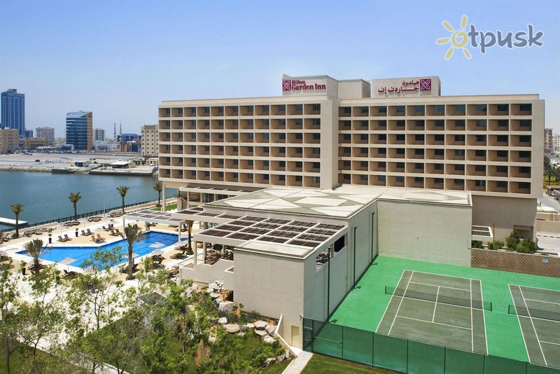Фото отеля Hilton Garden Inn Ras Al Khaimah 4* Рас Аль-Хайма ОАЭ экстерьер и бассейны
