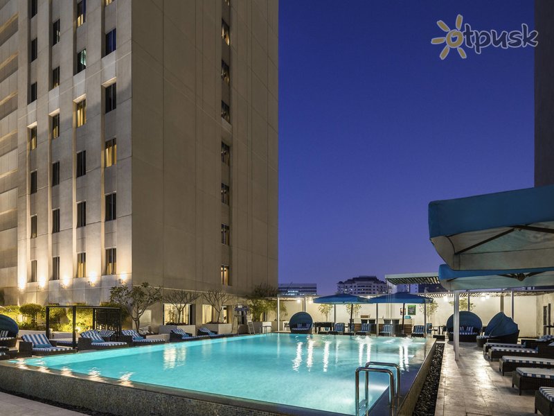 Фото отеля Novotel Deira City Centre 4* Дубай ОАЭ экстерьер и бассейны