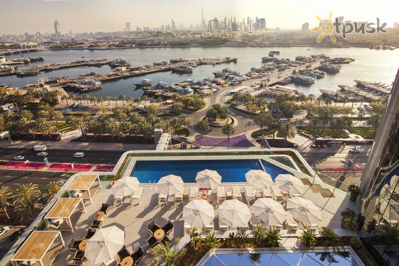 Фото отеля Al Bandar Rotana 5* Дубай ОАЭ экстерьер и бассейны