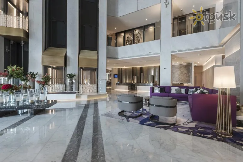 Фото отеля Al Bandar Rotana 5* Дубай ОАЕ лобі та інтер'єр