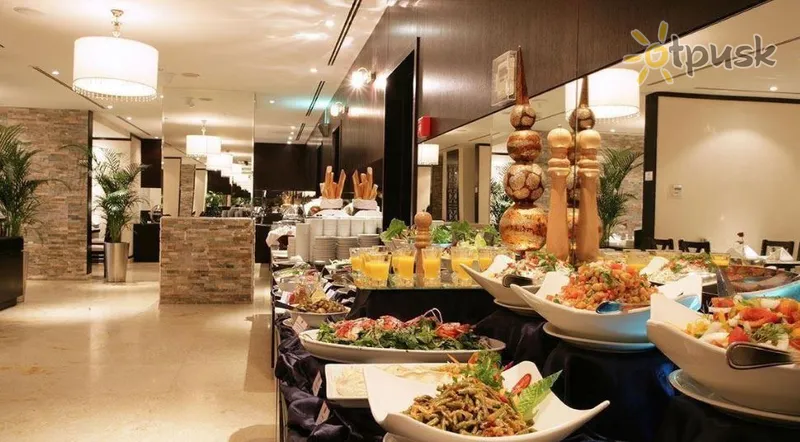 Фото отеля Ramada Hotel & Suites 4* Аджман ОАЭ бары и рестораны
