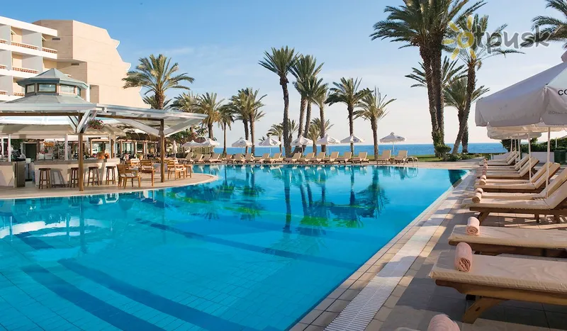 Фото отеля TUI Blue Pioneer Beach Hotel by Constantinou Bros hotels 4* Пафос Кипр экстерьер и бассейны