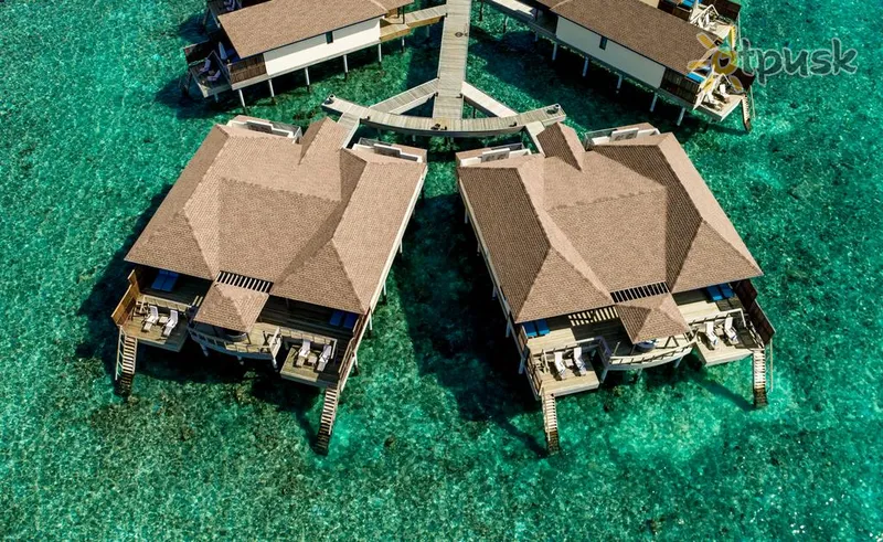Фото отеля Reethi Faru Resort 5* Raa atolas Maldyvai išorė ir baseinai