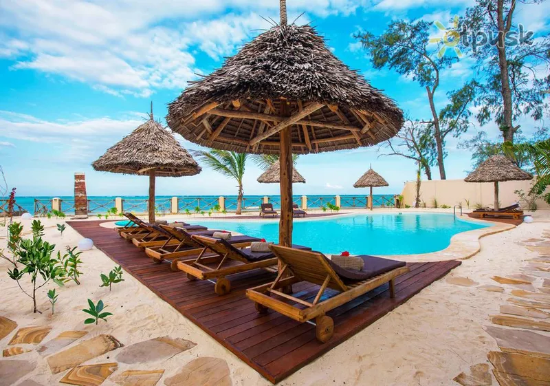 Фото отеля Clove Island Villas & Spa 4* Макундучи Танзания экстерьер и бассейны