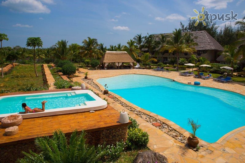 Фото отеля Fruit & Spice Wellness Resort 5* Кизимкази Танзания экстерьер и бассейны