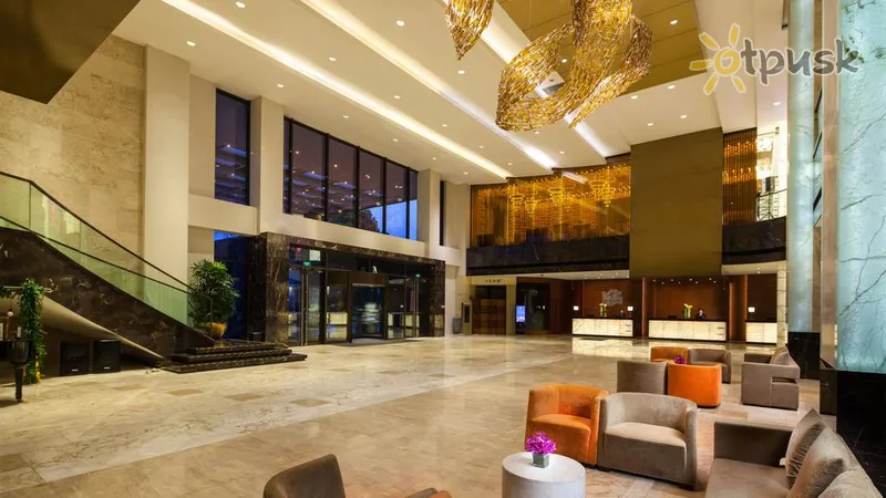 Фото отеля Holiday Inn Shanghai Jinxiu 4* Šanhaja Ķīna vestibils un interjers