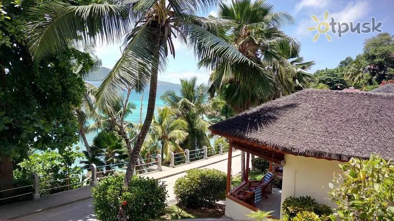 Фото отеля Patatran Village Hotel 3* par. La Digue Seišelu salas ārpuse un baseini