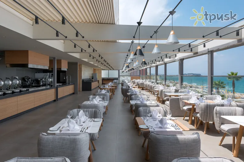 Фото отеля Ikones Seafront Luxury Suites 5* о. Крит – Ретимно Греція бари та ресторани