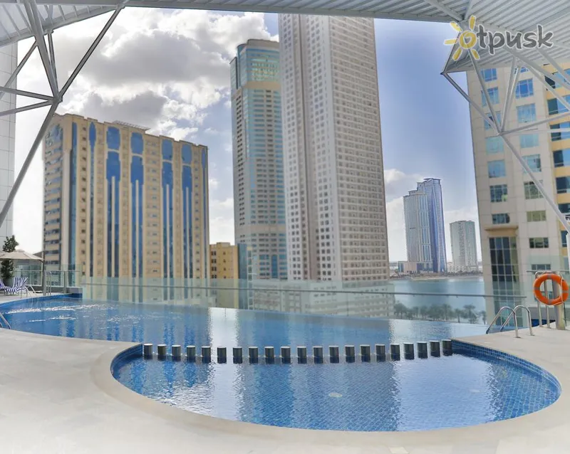Фото отеля Pullman Sharjah 5* Шарджа ОАЭ экстерьер и бассейны