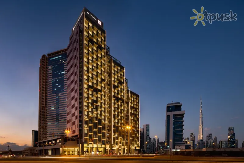 Фото отеля Millennium Atria Business Bay 5* Дубай ОАЭ экстерьер и бассейны