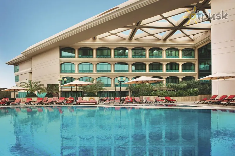 Фото отеля Movenpick Grand Al Bustan 5* Дубай ОАЕ екстер'єр та басейни