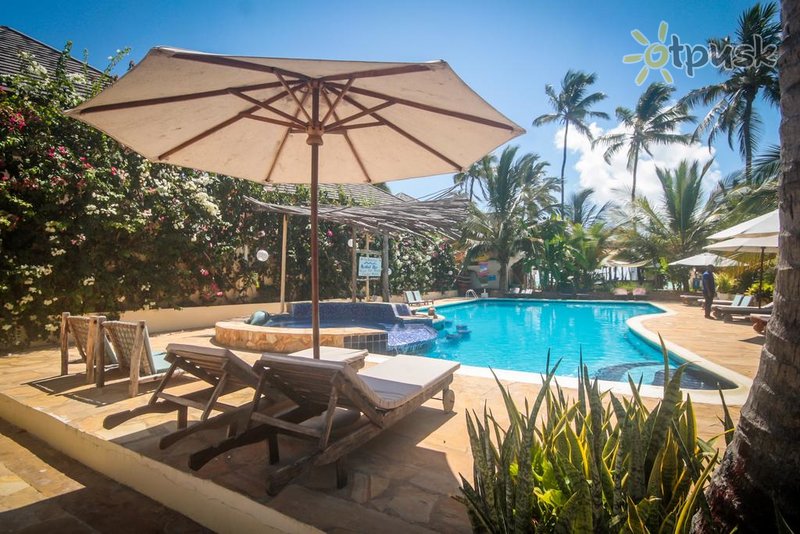 Фото отеля The Waterfront Zanzibar Beach Hotel 4* Паже Танзания экстерьер и бассейны