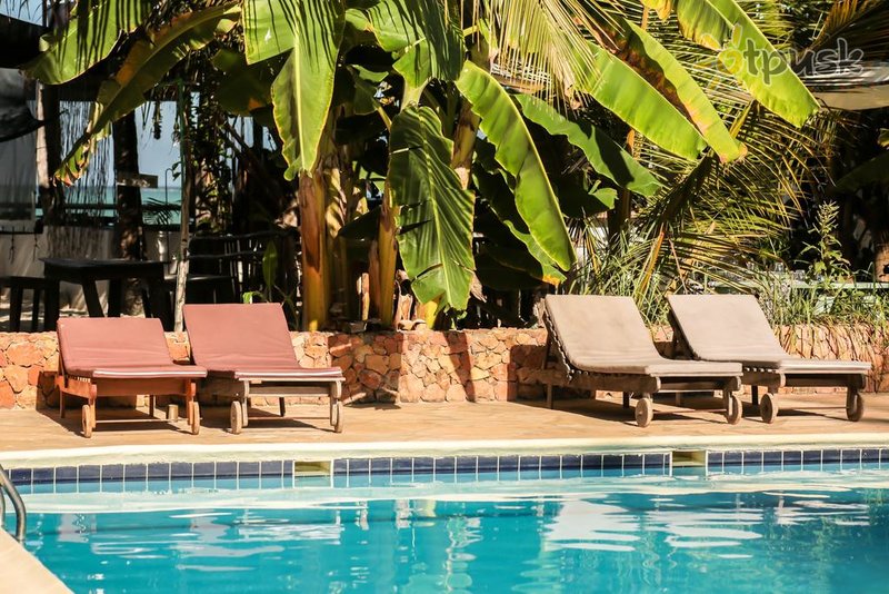 Фото отеля The Waterfront Zanzibar Beach Hotel 4* Паже Танзания экстерьер и бассейны