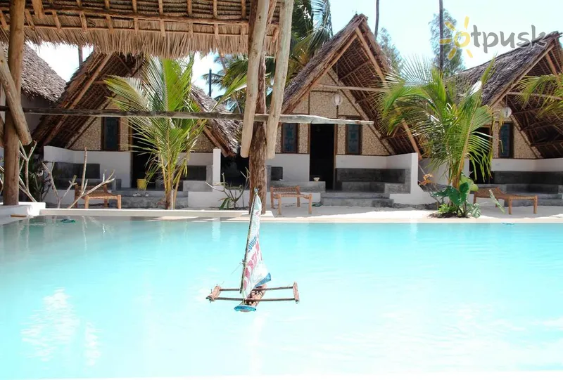 Фото отеля Nur Beach Hotel 3* Jambiani Tanzanija išorė ir baseinai