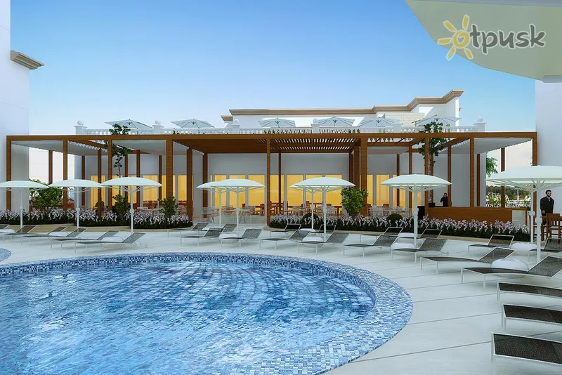 Фото отеля Al Jaddaf Rotana 5* Дубай ОАЕ екстер'єр та басейни