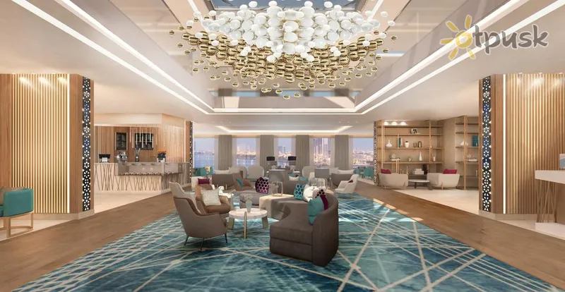 Фото отеля Doubletree By Hilton Ras Al Khaimah Corniche Hotel & Residences 4* Рас Аль-Хайма ОАЭ лобби и интерьер