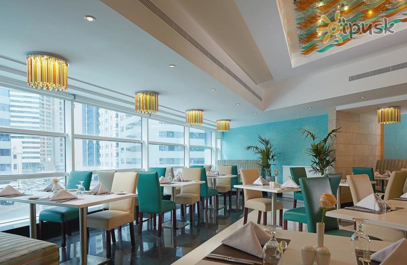 Фото отеля Golden Tulip Downtown Abu Dhabi 4* Абу Даби ОАЭ бары и рестораны
